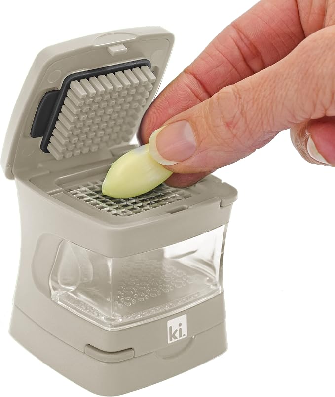 Garlic-A-Peel Garlic Press, Crusher, Cutter, Mincer, and Storage Container - Includes Silicone Garlic Peeler - Easy to Clean - Stainless Steel Blades – (Cream), standard
