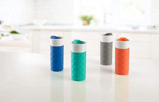 Ello Ogden 16oz Ceramic Travel Mug with Splash-Resistant Slider Lid and Protective Silicone Sleeve, Perfect for Coffee or Tea, BPA-Free, Dishwasher Safe | Splash-resistant ceramic travel mug with slider lid and protective silicone sleeve. BPA-free, gre...