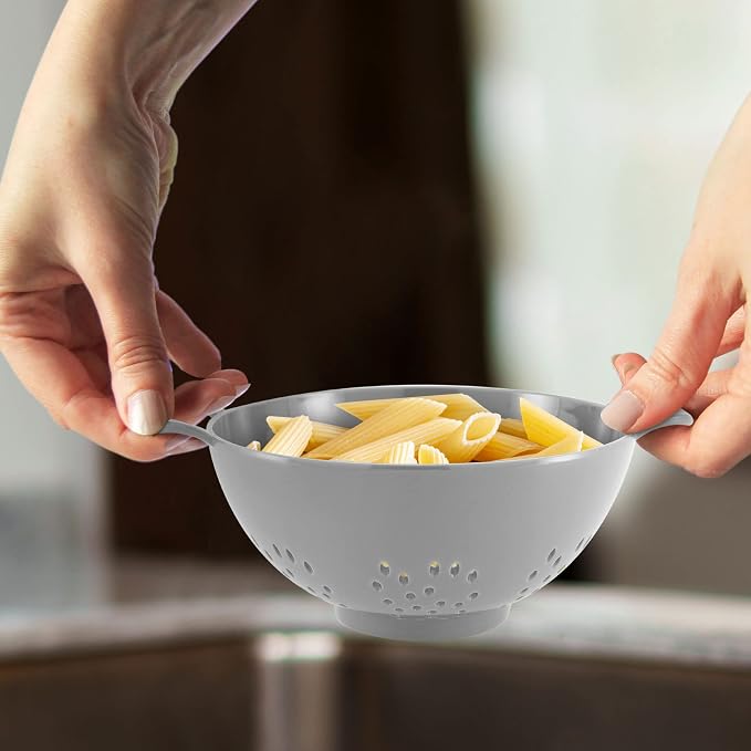 Meadow Lane 6-Inch Small Colander, 3-Cup Food Strainer, Silver Gray | BPA-free, dishwasher-safe mini colander has a wide, shallow bowl, 1/8-inch holes, two handles, ring foot and smooth edges.