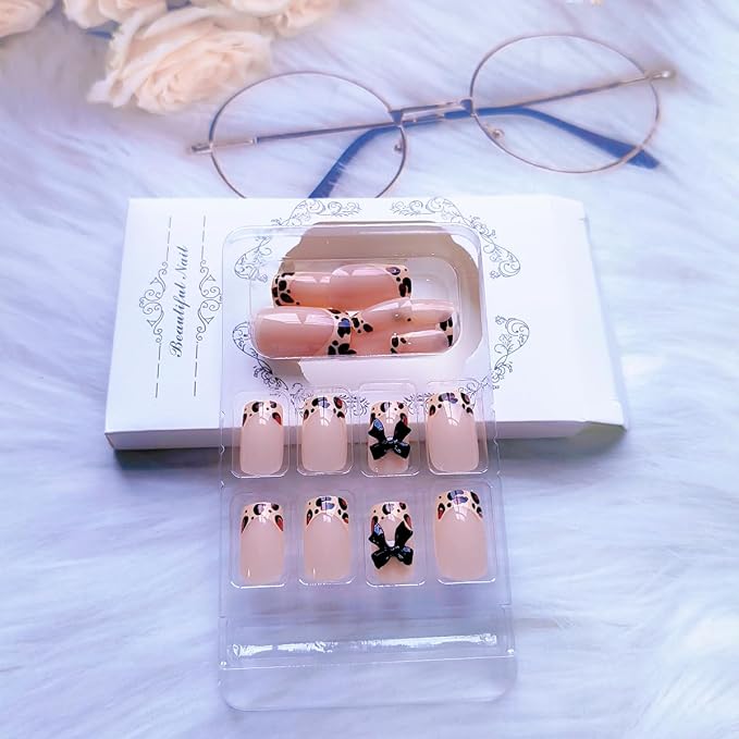 WLGDLH Medium Square Press on Nails Leopard Print French Fake Nails Press ons Nail Tips Kit 3D Black Bows Design Nude Glossy False Nails Full Cover Artificial Stick on Nail for Women 24Pcs