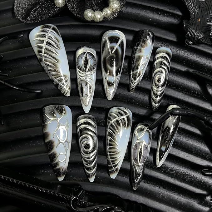 24Pcs Gothic Press on Nails Long Stiletto Fake Nails with Dark Eyes & Metallic Silver Line Design Punk Y2K Acrylic Nails Black Dark Goth Glue on Nails Reusable Stick on Nails for Women Halloween Party