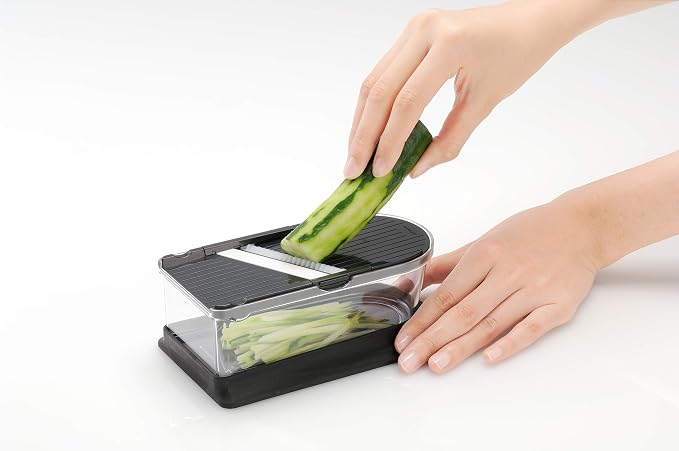 Kyocera Advanced Ceramics 6-Piece Mini Slicer Sets Inludes: Mandoline Slicer; Julienne Slicer; Grater; Storage Container; Handguard