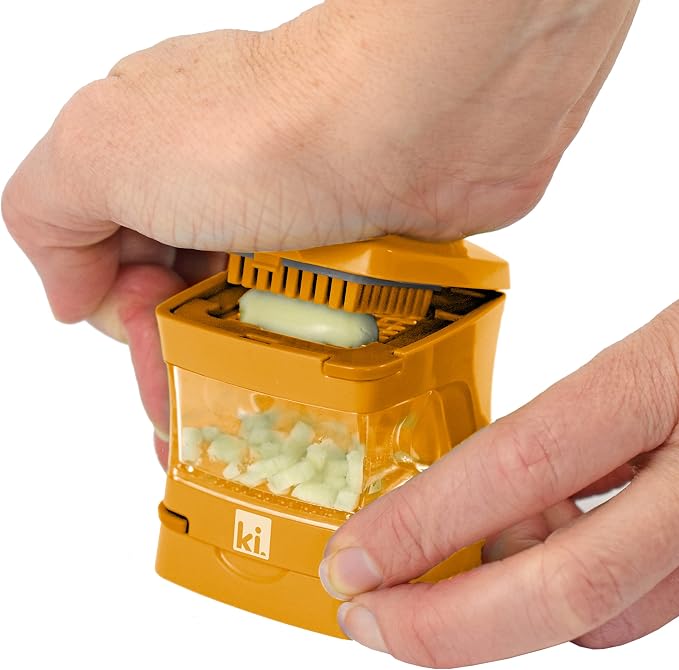 Garlic-A-Peel Garlic Press, Crusher, Cutter, Mincer, and Storage Container - Includes Silicone Garlic Peeler - Easy to Clean - Stainless Steel Blades – (Honey), standard