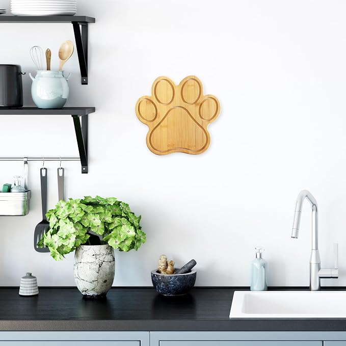 Totally Bamboo Dog Paw Shaped Cutting and Charcuterie Board, 11 x 10 in | Bamboo paw-shaped serving board with juice grooves for prep and entertaining. Built-in keyhole for easy wall display.