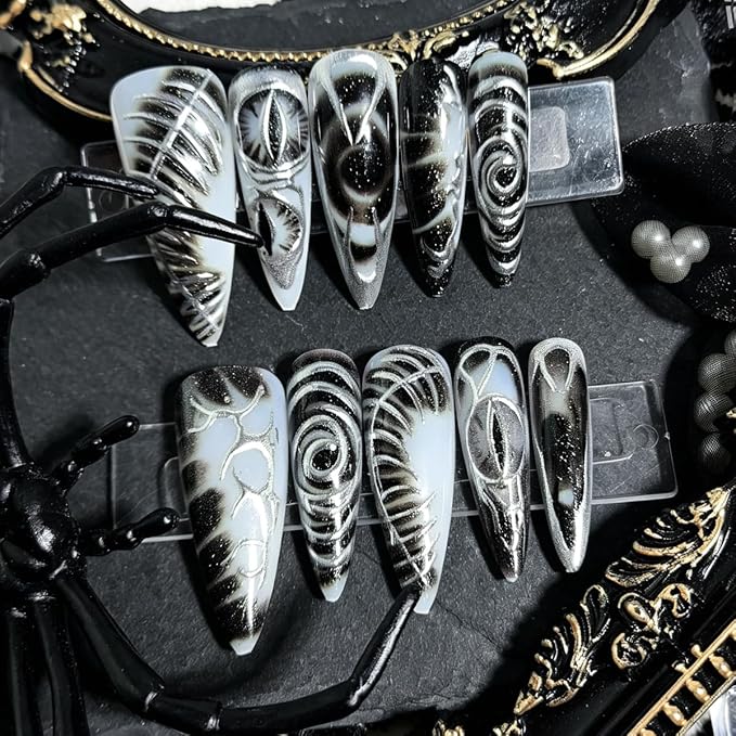 24Pcs Gothic Press on Nails Long Stiletto Fake Nails with Dark Eyes & Metallic Silver Line Design Punk Y2K Acrylic Nails Black Dark Goth Glue on Nails Reusable Stick on Nails for Women Halloween Party