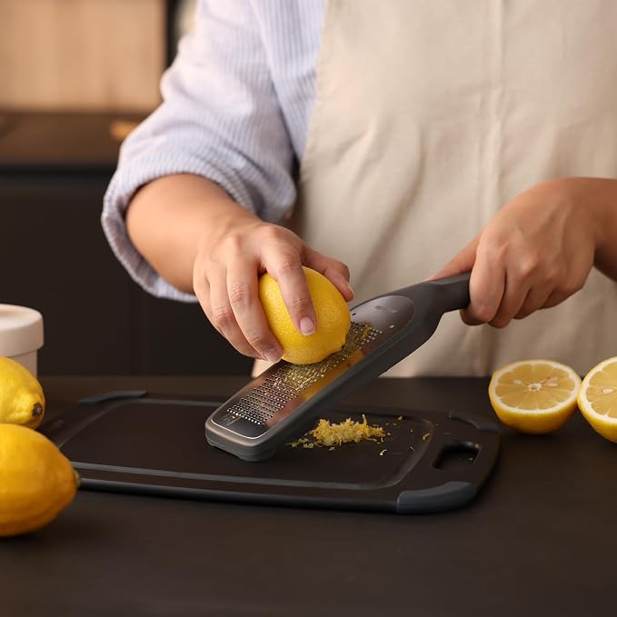 Zyliss Fine Grater and Zester - Handheld Grater with Stainless Steel Blade & Wheat Straw Handle - Ideal for Hard Cheese, Chocolate, Fruit, Vegetables, & More - Protective Cover Doubles as Scraper