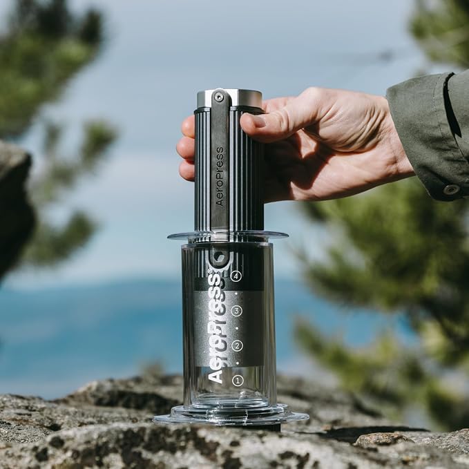 AeroPress Manual Coffee Grinder, Portable Hand Burr Grinder | Titanium-Coated Conical Burrs, 60 Grind Settings, Compact Travel