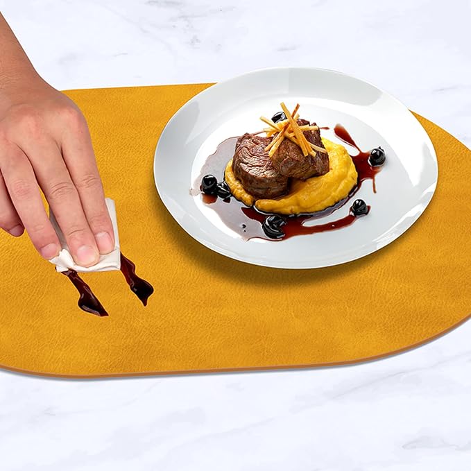 ADRIMER Placemats, Heat Resistant Oval Placemats Set of 12 Washable 12 x 17 Inch, Waterproof Table Mats, Wipeable Pu Place Mats for Kitchen, Dining Room, Yellow