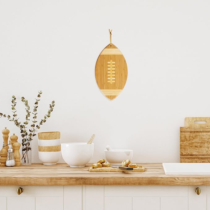 Totally Bamboo Football Shaped Cutting Board and Charcuterie Board | Football serving board for game day watch parties and tailgating. Smooth reverse side for prep. Hangs as decor between uses.