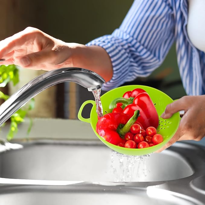 Meadow Lane 6-Inch Small Colander, 3-Cup Food Strainer, Meadow Green | BPA-free, dishwasher-safe mini colander has a wide, shallow bowl, 1/8-inch holes, two handles, ring foot and smooth edges.