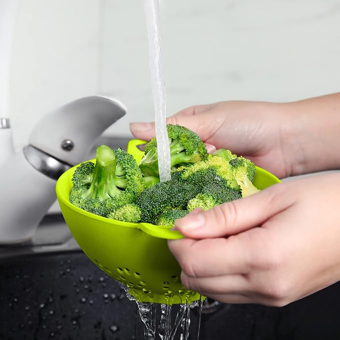 Meadow Lane 6-Inch Small Colander, 3-Cup Food Strainer, Meadow Green | BPA-free, dishwasher-safe mini colander has a wide, shallow bowl, 1/8-inch holes, two handles, ring foot and smooth edges.