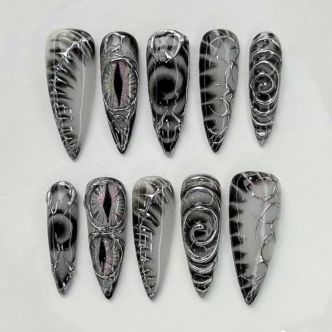 24Pcs Gothic Press on Nails Long Stiletto Fake Nails with Dark Eyes & Metallic Silver Line Design Punk Y2K Acrylic Nails Black Dark Goth Glue on Nails Reusable Stick on Nails for Women Halloween Party