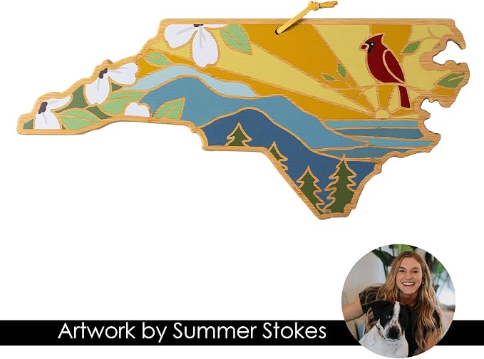 Totally Bamboo North Carolina State Shaped Cutting Board, Summer Stokes Art | State charcuterie board with colorful hand-drawn landscape art. Smooth reverse side for food prep. Hang tie for wall display.