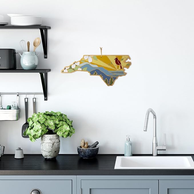 Totally Bamboo North Carolina State Shaped Cutting Board, Summer Stokes Art | State charcuterie board with colorful hand-drawn landscape art. Smooth reverse side for food prep. Hang tie for wall display.