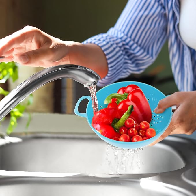Meadow Lane 6-Inch Small Colander, 3-Cup Food Strainer, Light Blue | BPA-free, dishwasher-safe mini colander has a wide, shallow bowl, 1/8-inch holes, two handles, ring foot and smooth edges.