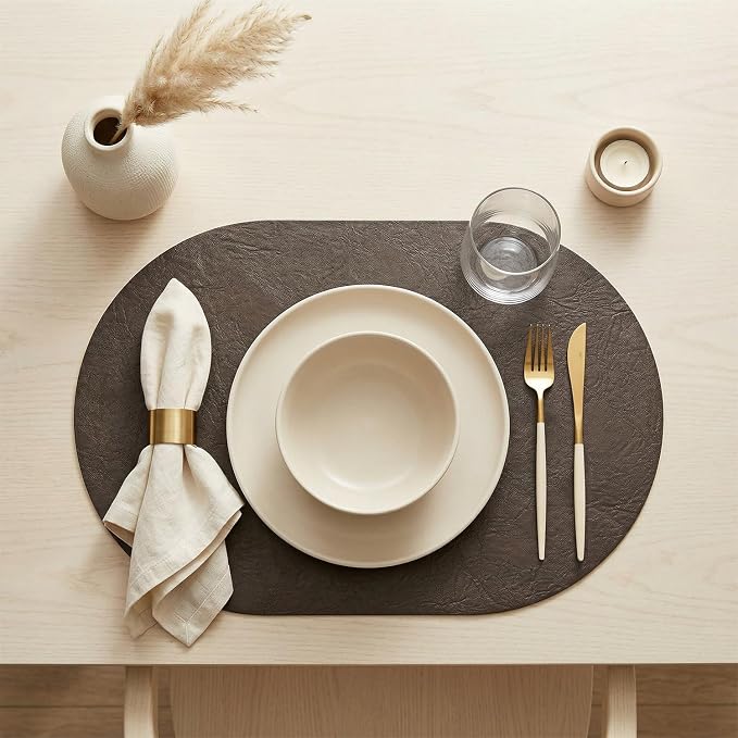 Artoid Mode Coffee Brown Faux Leather Oval Placemats Set of 6, 12 x 18 Inch Waterproof Wipeable Heat Resistant Vinyl Place Mats, Reversible Table Mats for Kitchen Dining Decor