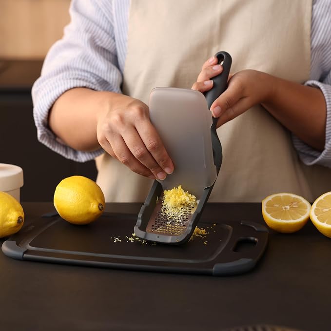 Zyliss Fine Grater and Zester - Handheld Grater with Stainless Steel Blade & Wheat Straw Handle - Ideal for Hard Cheese, Chocolate, Fruit, Vegetables, & More - Protective Cover Doubles as Scraper