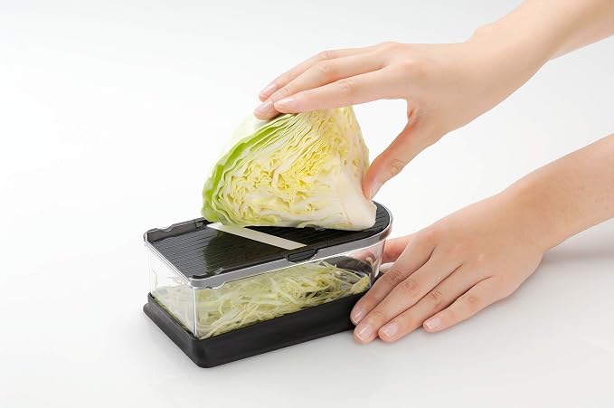 Kyocera Advanced Ceramics 6-Piece Mini Slicer Sets Inludes: Mandoline Slicer; Julienne Slicer; Grater; Storage Container; Handguard