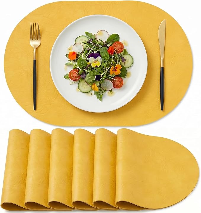 Artoid Mode Yellow Faux Leather Oval Placemats Set of 6, 12 x 18 Inch Waterproof Wipeable Heat Resistant Vinyl Place Mats, Reversible Table Mats for Kitchen Dining Decor