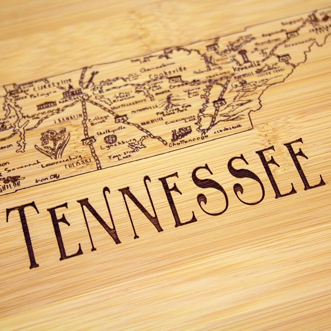 Totally Bamboo A Slice of Life Tennessee Engraved Map Cutting Board | 11” x 8.75” charcuterie board with engraved state map artwork. Smooth reverse side for food prep. Hang tie for wall display.