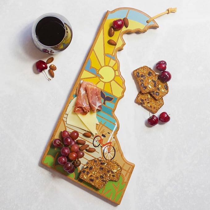 Totally Bamboo Delaware State Shaped Cutting Board, Summer Stokes Art | State charcuterie board with colorful hand-drawn landscape art. Smooth reverse side for food prep. Hang tie for wall display.