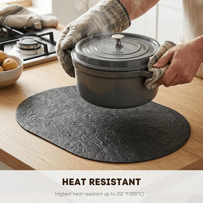 Artoid Mode Black Faux Leather Oval Placemats Set of 4, 12 x 18 Inch Waterproof Wipeable Heat Resistant Vinyl Place Mats, Reversible Table Mats for Kitchen Dining Decor