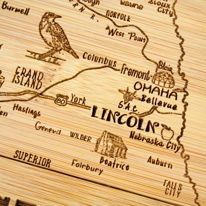 Totally Bamboo A Slice of Life Nebraska Engraved Map Cutting Board | 11” x 8.75” charcuterie board with engraved state map artwork. Smooth reverse side for food prep. Hang tie for wall display.