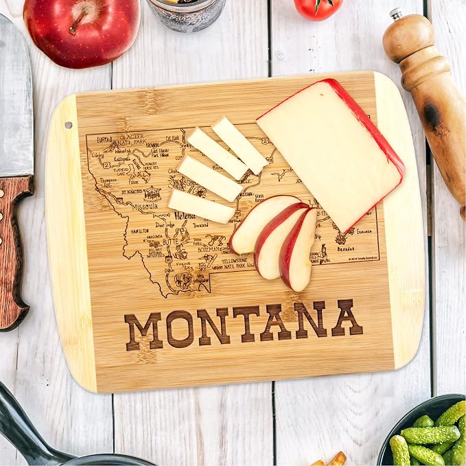 Totally Bamboo A Slice of Life Montana Engraved Map Cutting Board | 11” x 8.75” charcuterie board with engraved state map artwork. Smooth reverse side for food prep. Hang tie for wall display.
