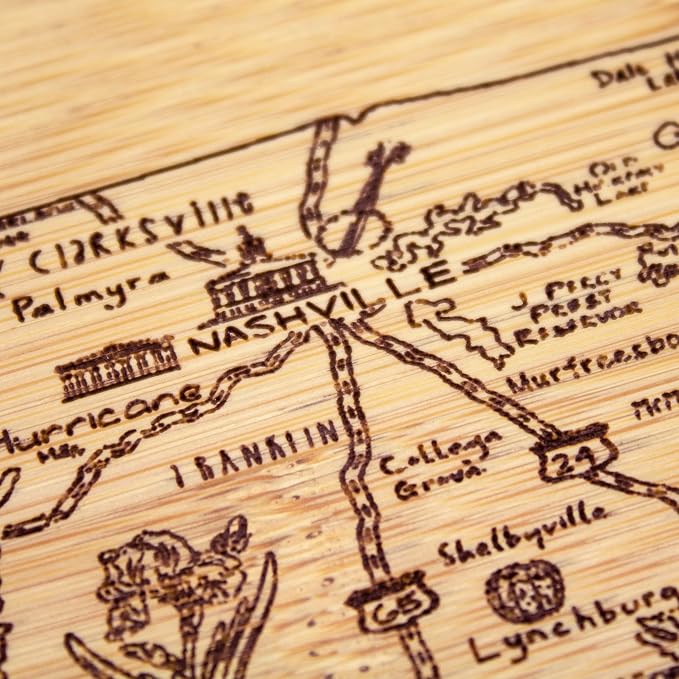 Totally Bamboo A Slice of Life Tennessee Engraved Map Cutting Board | 11” x 8.75” charcuterie board with engraved state map artwork. Smooth reverse side for food prep. Hang tie for wall display.