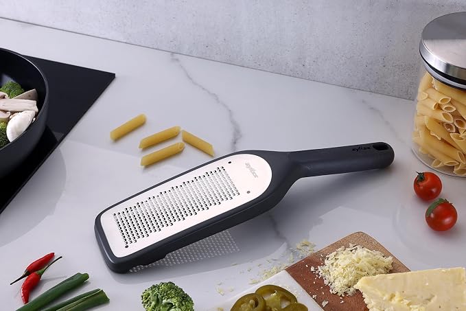 Zyliss Fine Grater and Zester - Handheld Grater with Stainless Steel Blade & Wheat Straw Handle - Ideal for Hard Cheese, Chocolate, Fruit, Vegetables, & More - Protective Cover Doubles as Scraper