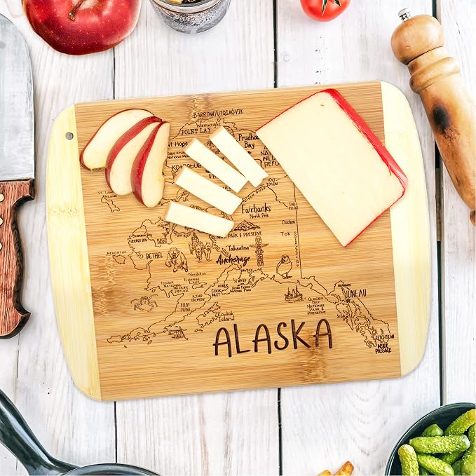 Totally Bamboo A Slice of Life Alaska Engraved Map Cutting Board | 11” x 8.75” charcuterie board with engraved state map artwork. Smooth reverse side for food prep. Hang tie for wall display.