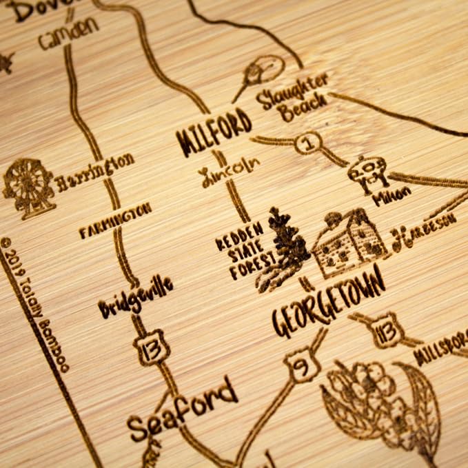 Totally Bamboo A Slice of Life Delaware Engraved Map Cutting Board | 11” x 8.75” charcuterie board with engraved state map artwork. Smooth reverse side for food prep. Hang tie for wall display.