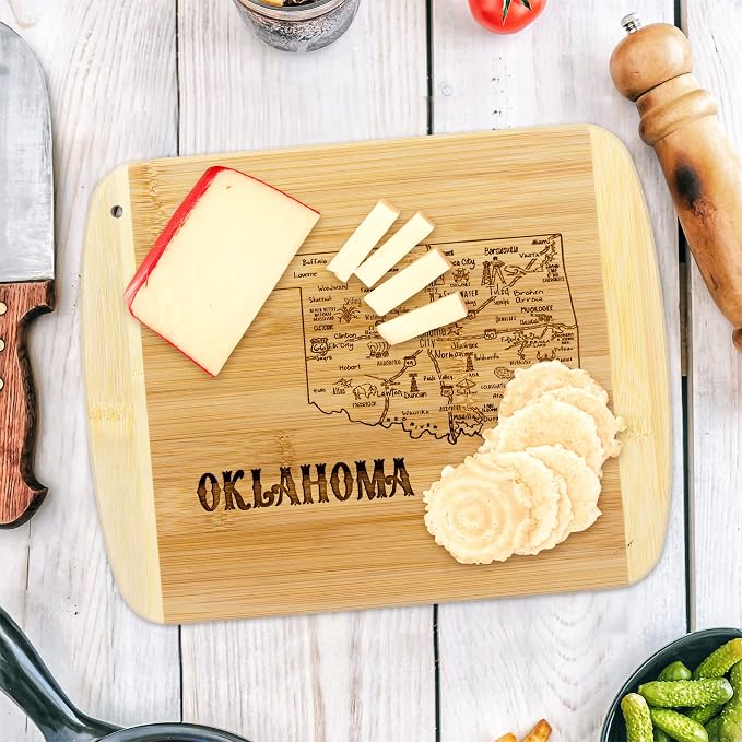 Totally Bamboo A Slice of Life Oklahoma Engraved Map Cutting Board | 11” x 8.75” charcuterie board with engraved state map artwork. Smooth reverse side for food prep. Hang tie for wall display.