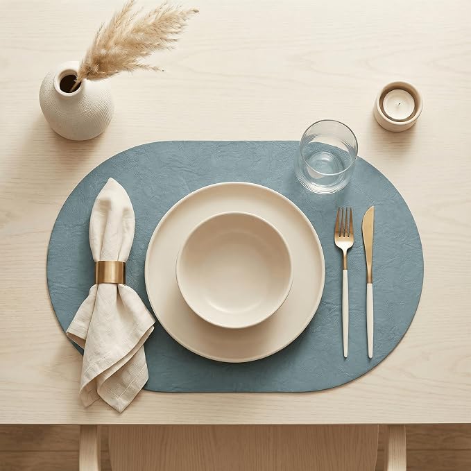 Artoid Mode Blue Faux Leather Oval Placemats Set of 6, 12 x 18 Inch Waterproof Wipeable Heat Resistant Vinyl Place Mats, Reversible Table Mats for Kitchen Dining Decor