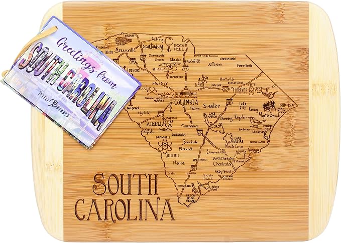 Totally Bamboo A Slice of Life South Carolina Engraved Map Cutting Board | 11” x 8.75” charcuterie board with engraved state map artwork. Smooth reverse side for food prep. Hang tie for wall display.