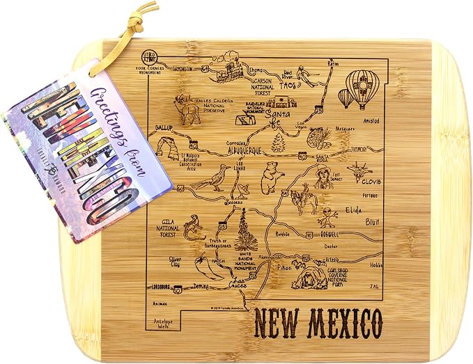 Totally Bamboo A Slice of Life New Mexico Engraved Map Cutting Board | 11” x 8.75” charcuterie board with engraved state map artwork. Smooth reverse side for food prep. Hang tie for wall display.
