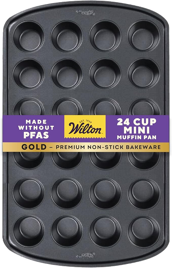 Wilton Gold Non-Stick Muffin Pan, Made Without PFAS, 24-Cup | Non-Stick Steel with Scratch-Resistant Coating, Resists Warping, Extended Handles, Dishwasher Safe, Perfect for Cupcakes