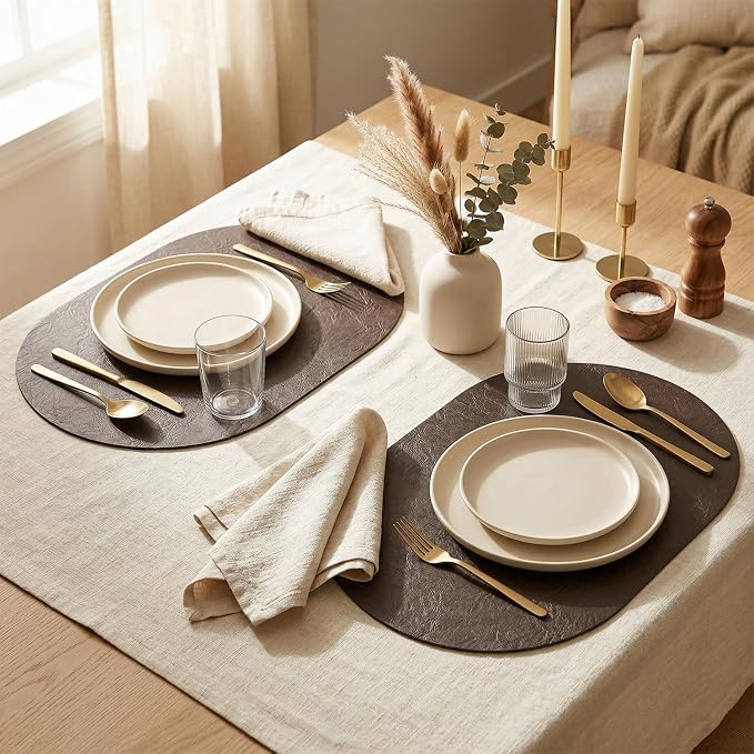 Artoid Mode Coffee Brown Faux Leather Oval Placemats Set of 6, 12 x 18 Inch Waterproof Wipeable Heat Resistant Vinyl Place Mats, Reversible Table Mats for Kitchen Dining Decor