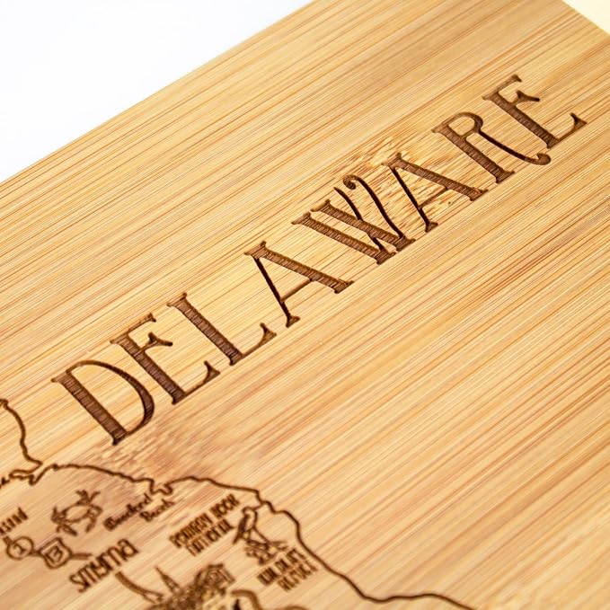 Totally Bamboo A Slice of Life Delaware Engraved Map Cutting Board | 11” x 8.75” charcuterie board with engraved state map artwork. Smooth reverse side for food prep. Hang tie for wall display.