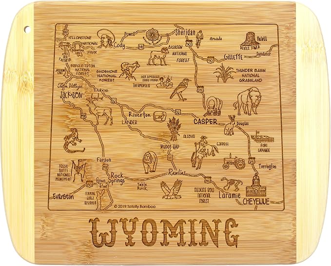 Totally Bamboo A Slice of Life Wyoming Engraved Map Cutting Board | 11” x 8.75” charcuterie board with engraved state map artwork. Smooth reverse side for food prep. Hang tie for wall display.
