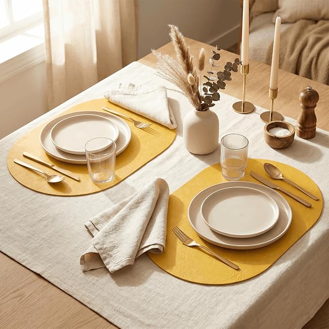 Artoid Mode Yellow Faux Leather Oval Placemats Set of 6, 12 x 18 Inch Waterproof Wipeable Heat Resistant Vinyl Place Mats, Reversible Table Mats for Kitchen Dining Decor