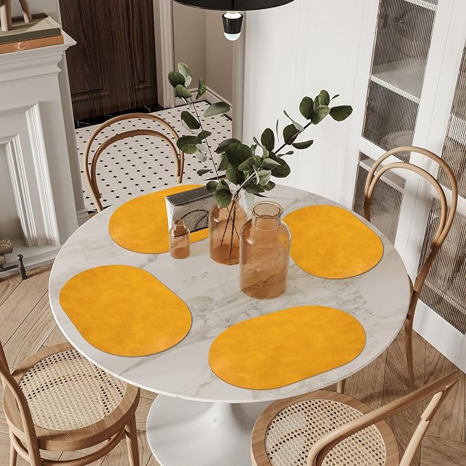 ADRIMER Placemats, Heat Resistant Oval Placemats Set of 12 Washable 12 x 17 Inch, Waterproof Table Mats, Wipeable Pu Place Mats for Kitchen, Dining Room, Yellow