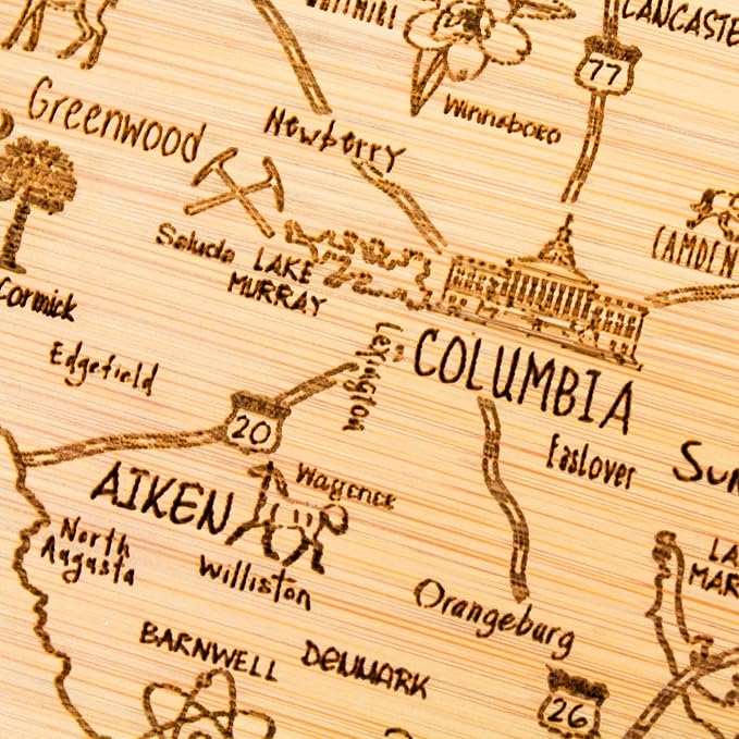 Totally Bamboo A Slice of Life South Carolina Engraved Map Cutting Board | 11” x 8.75” charcuterie board with engraved state map artwork. Smooth reverse side for food prep. Hang tie for wall display.