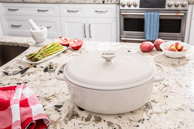 Lodge Oval Dutch Oven - Enameled Cast Iron Oval Dutch Oven with Lid - Family Size Cooking Pot with Dual Handles for Sourdough Bread Baking & Everyday Cooking - 7 Quart - Oyster White