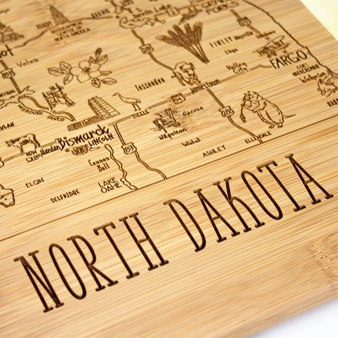 Totally Bamboo A Slice of Life North Dakota Engraved Map Cutting Board | 11” x 8.75” charcuterie board with engraved state map artwork. Smooth reverse side for food prep. Hang tie for wall display.