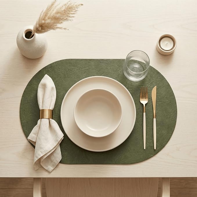 Artoid Mode Olive Green Faux Leather Oval Placemats Set of 4, 12 x 18 Inch Waterproof Wipeable Heat Resistant Vinyl Place Mats, Reversible Table Mats for Kitchen Dining Decor