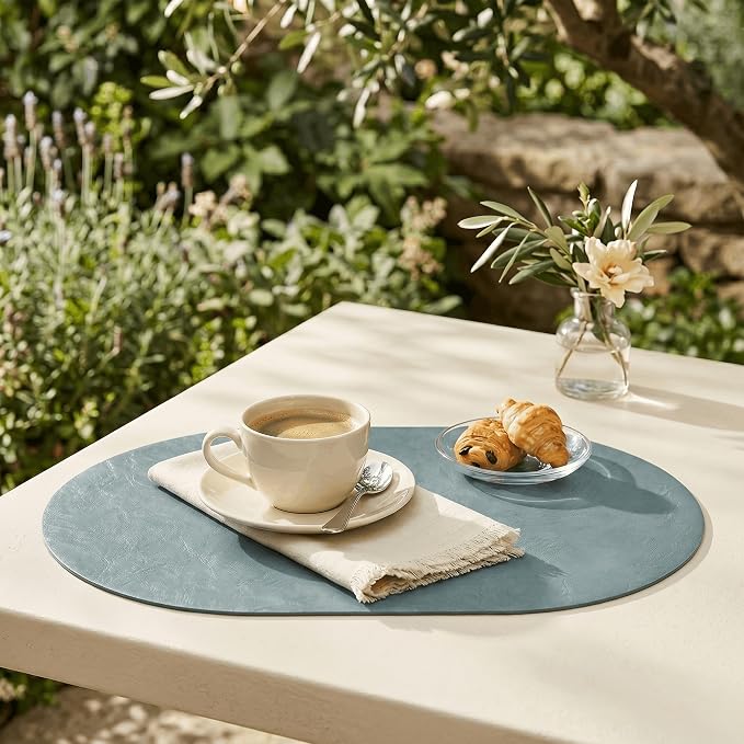 Artoid Mode Blue Faux Leather Oval Placemats Set of 4, 12 x 18 Inch Waterproof Wipeable Heat Resistant Vinyl Place Mats, Reversible Table Mats for Kitchen Dining Decor