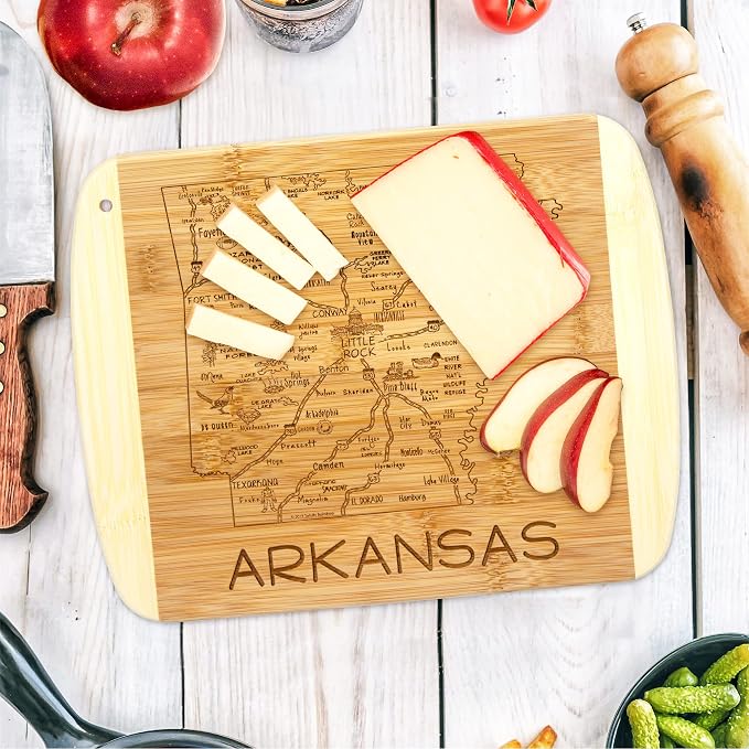 Totally Bamboo A Slice of Life Arkansas Engraved Map Cutting Board | 11” x 8.75” charcuterie board with engraved state map artwork. Smooth reverse side for food prep. Hang tie for wall display.