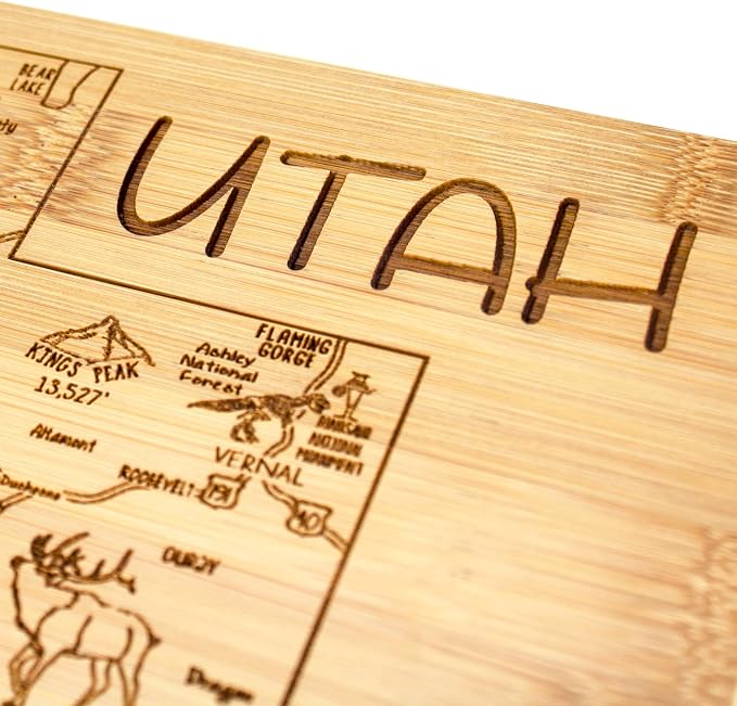 Totally Bamboo A Slice of Life Utah Engraved Map Cutting Board | 11” x 8.75” charcuterie board with engraved state map artwork. Smooth reverse side for food prep. Hang tie for wall display.