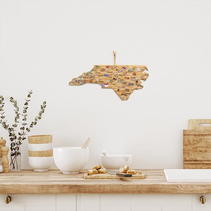 Totally Bamboo North Carolina State Shaped Cutting Board, Art by Fish Kiss | State charcuterie board with colorful hand-drawn map artwork. Smooth reverse side for food prep. Hang tie for wall display.